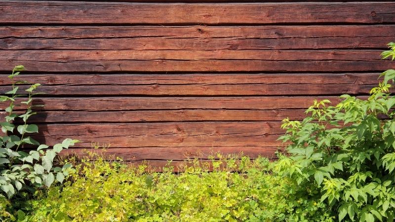 Holzwand um Komposter zu verstecken
